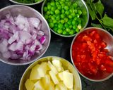 A picture of step 2 of Batata Kanda Poha.