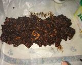 A picture of step 7 of Chocolate and biscuit salami.
