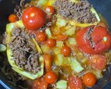 Une image de l'étape 3 de Tomates et courgettes farcies à la poêle.