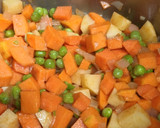 Foto del paso 4 de la receta: Potaje de garbanzos, calabaza, batata y guisantes