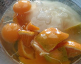 Foto del paso 1 de la receta: Bizcocho de naranja, nueces y pasas