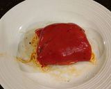 A picture of step 12 of Roasted Red Peppers Stuffed with pasta in a Garlic Broth.
