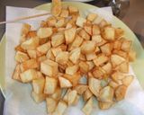 Foto del paso 2 de la receta Bacalao con nata y patatas fritas al horno
