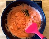 A picture of step 5 of Sausage pasta bake in tomato cream sauce.