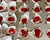 A picture of step 2 of Baked Caprese Cups.
