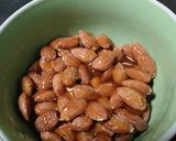 A picture of step 2 of Caramelized Almonds with Sesame and Honey in the Air Fryer.