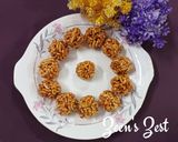 A picture of step 5 of Puffed Rice Laddoos.