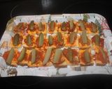 Foto del paso 6 de la receta Pan de molde con sardinas, calamares y pepinillos
