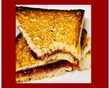 A picture of step 2 of Bread jam sandwiches.