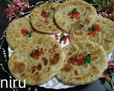 A picture of step 12 of Moong dal paratha Moong dal ki puran puli Pesarapappu bobbatlu.
