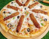 A picture of step 7 of Chicken Kabab Pizza 🍕🍕.