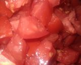 A picture of step 1 of Eggs with Tomato and Onion.