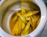 A picture of step 1 of Amba Khatta/Mango Jaggery curry.