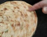 A picture of step 7 of Muli de parathe with batter and dahi.