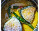 A picture of step 1 of Ilish bhapa.