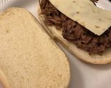 A picture of step 2 of Slow cooker spicy beef sandwiches.