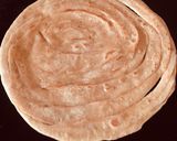 A picture of step 13 of Alu meethi with paratha.