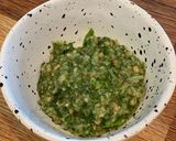 A picture of step 1 of Halloumi with pesto, balsamic tomatoes, spinach and chickpeas.