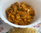 A picture of step 14 of Creamy Cheesy Schezwan Pasta.