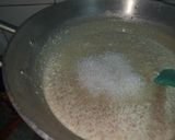 A picture of step 13 of Dodha Burfi with Daliya.
