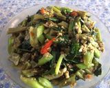 Foto langkah ke 5 dari resep Tumis daun talas tempe bungkil malang.
