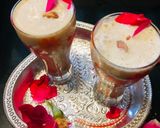 A picture of step 4 of Thandai with rose petals.