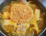 A picture of step 7 of Nanyang-Style Laksa Shrimp Noodles.