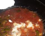 A picture of step 7 of Italian pasta in red sauce.