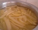 A picture of step 3 of Fried chips with kachumbari.