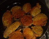 A picture of step 3 of Coated eggplant fries.