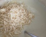 A picture of step 2 of Potato, cauliflower, cabbage cheesy bake.