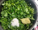 A picture of step 1 of Sarson ka Saag with makai roti.