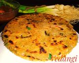 A picture of step 8 of Jowar Roti with Green Garlic.