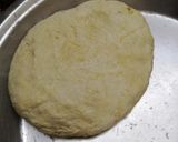 A picture of step 1 of Jain Cheese burst pizza.