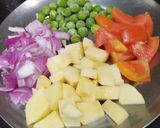 A picture of step 2 of Vegetable Broken Wheat khichdi.