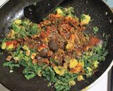 A picture of step 2 of Bharwan Karela.