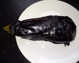 A picture of step 1 of Aubergine fills /Baingan ka bharta.