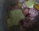 A picture of step 2 of Palak chicken with boiled rice.