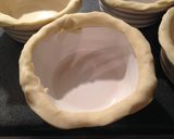 A picture of step 6 of Chicken, Leek and Bacon Pies.