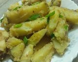 A picture of step 7 of Garlic buttery potato wedges.