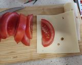 Foto del paso 6 de la receta: Pollo con queso y tomate