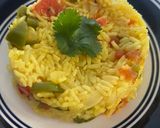 A picture of step 8 of Yellow Rice with Jalapeños and Tomatoes.