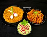 A picture of step 6 of Multigrain Masala Paratha - Ivy Gourd Sabzi - Mint Pomegranate Dahi Raita.