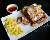 A picture of step 14 of Peanut Butter French Toast Roll-Ups With Banana & Almond Filling.
