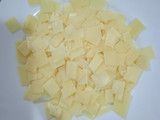Parmigiana di patate con prosciutto cotto e formaggio