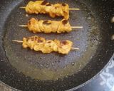 A picture of step 16 of Chicken tandoori tikka boti in frying pan.