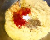 A picture of step 2 of Arbi leaves pakoda/ fritters.