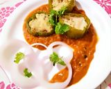 A picture of step 6 of Punjabi Paneer stuffed Capsicum in Red Gravy.