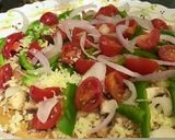 A picture of step 2 of Veggies pizza.