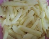 A picture of step 1 of Kfc style chicken garlic fries.